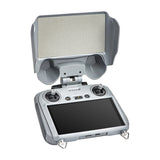 DJI RC 2 mit aufgeklappter STARTRC Sonnenblende